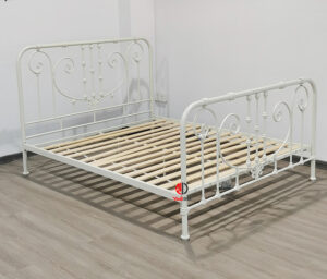 Brass-Accented Iron Art Bed